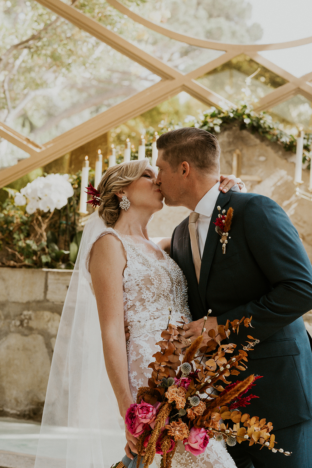 Blue Moon Dream DIY Wedding at Wayfarers Chapel in Palos Verdes, CA bride and groom kissing at alter
