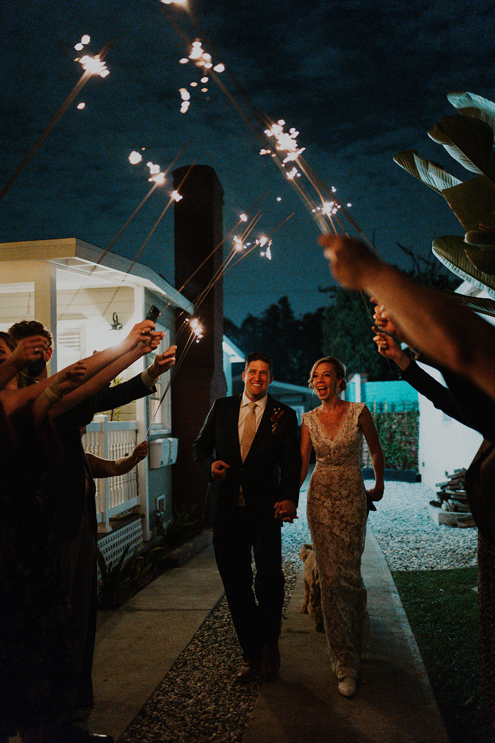 Blue Moon Dream DIY Wedding at Wayfarers Chapel in Palos Verdes, CA bride and groom sparkler send off